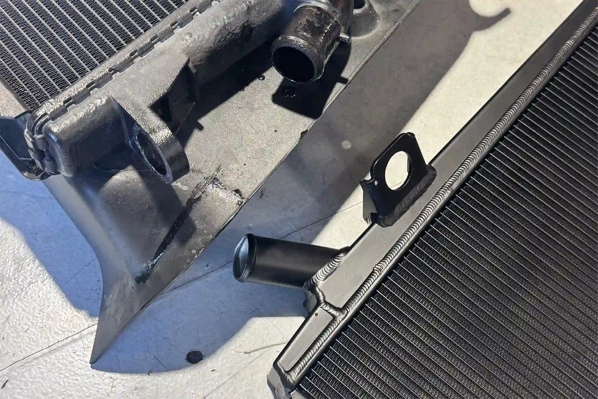 CSF Ferrari 458 performance radiator compared with OEM unit