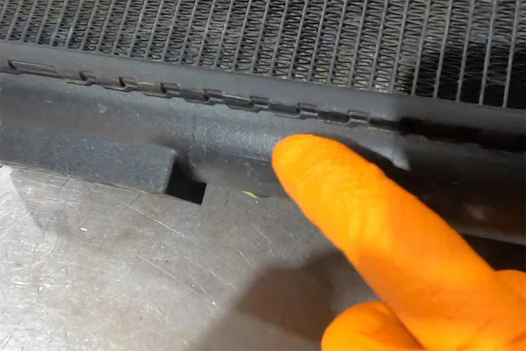 Failed OEM core-to-plastic-tank bond on the Ferrari V12 radiator