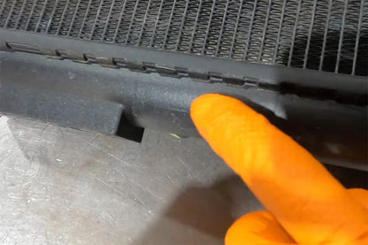 Failed OEM core-to-plastic-tank bond on the Ferrari V12 radiator